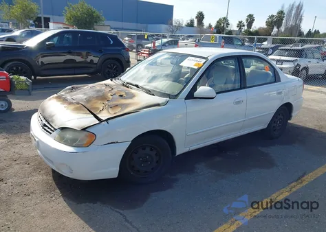 2003 Kia Spectra Ls z USA, uszkodzony, nr VIN KNAFB121435271289